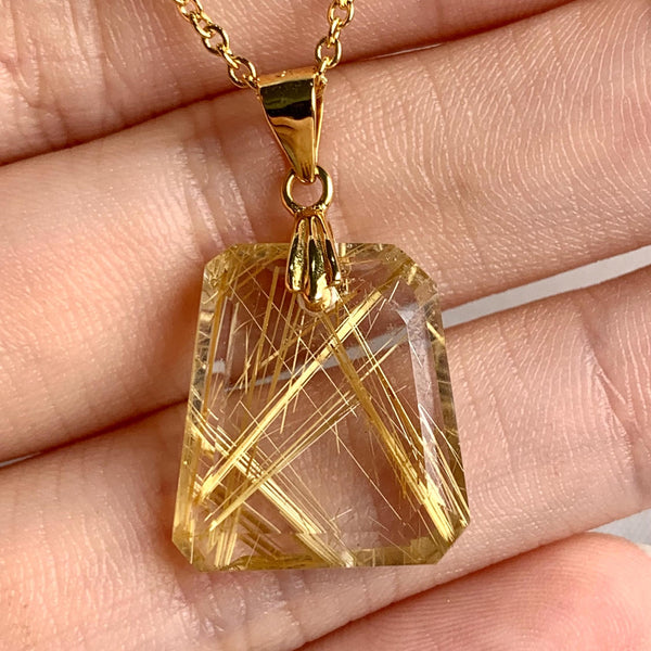 AAAA Rutilated Quartz pendant with brilliant golden rutile needle inclusions