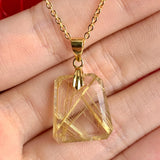 Natural high-clarity Rutilated Quartz pendant with sterling silver chain
