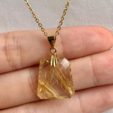AAAA faceted Rutilated Quartz gemstone necklace with natural golden inclusions