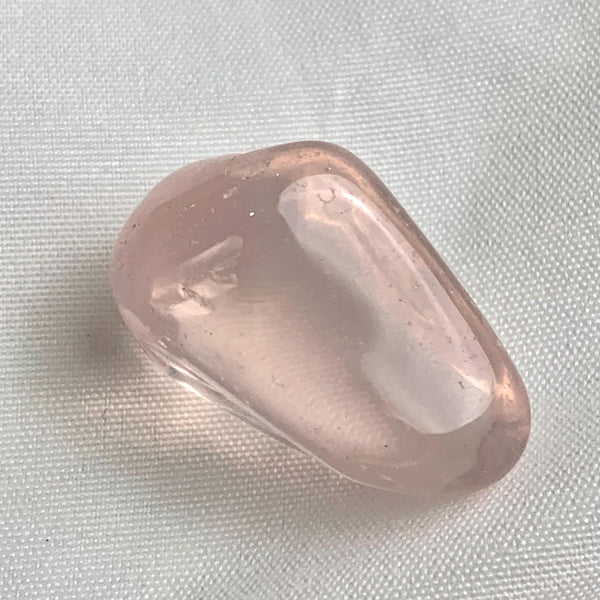 Madagascar star rose quartz rough showing flat polished surface and pink color