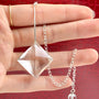 Faceted clear quartz pendulum crystal with attached sterling silver chain