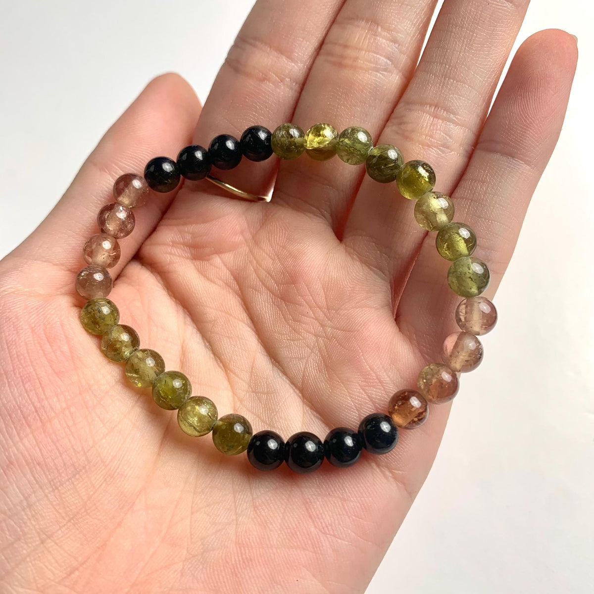Natural gemstone bracelet featuring colorful tourmaline crystal beads