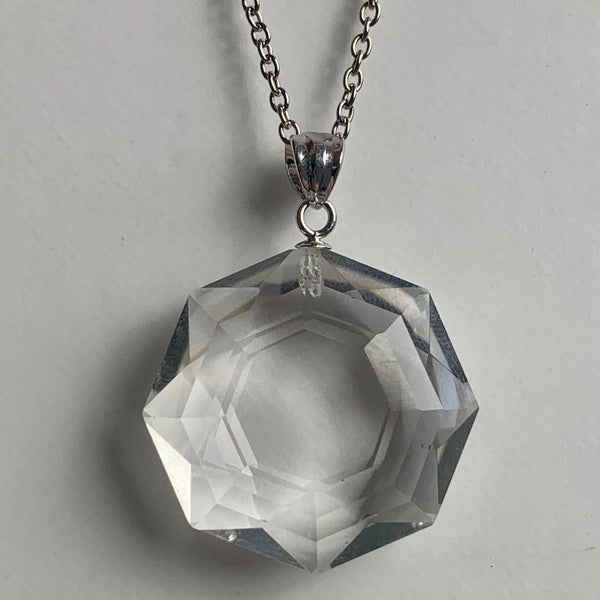Minimalist sterling silver necklace featuring premium clear quartz pendant