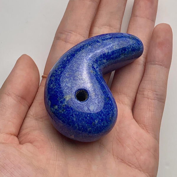 Natural blue Lapis Lazuli magatama pendant with a smooth polished finish