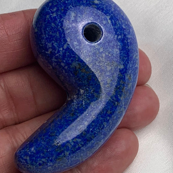 Natural blue Lapis Lazuli magatama pendant with a smooth polished finish