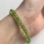 Green peridot bracelet made with smooth 5mm rondelle beads