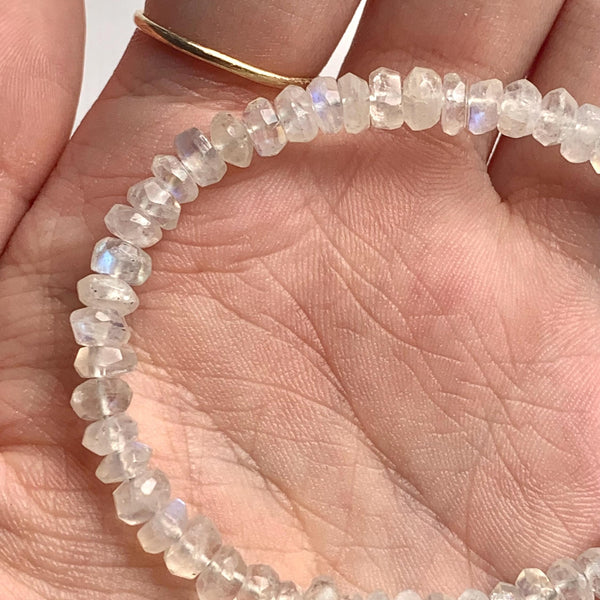 Blue and rainbow moonstone crystal bracelet with faceted rondelle beads