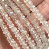 Rainbow moonstone jewelry featuring smooth-edged faceted rondelle beads