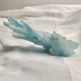 Top-down perspective of the straight branch pattern on a 164g blue aragonite cluster.