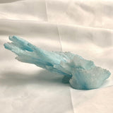 Top-down perspective of the straight branch pattern on a 164g blue aragonite cluster.