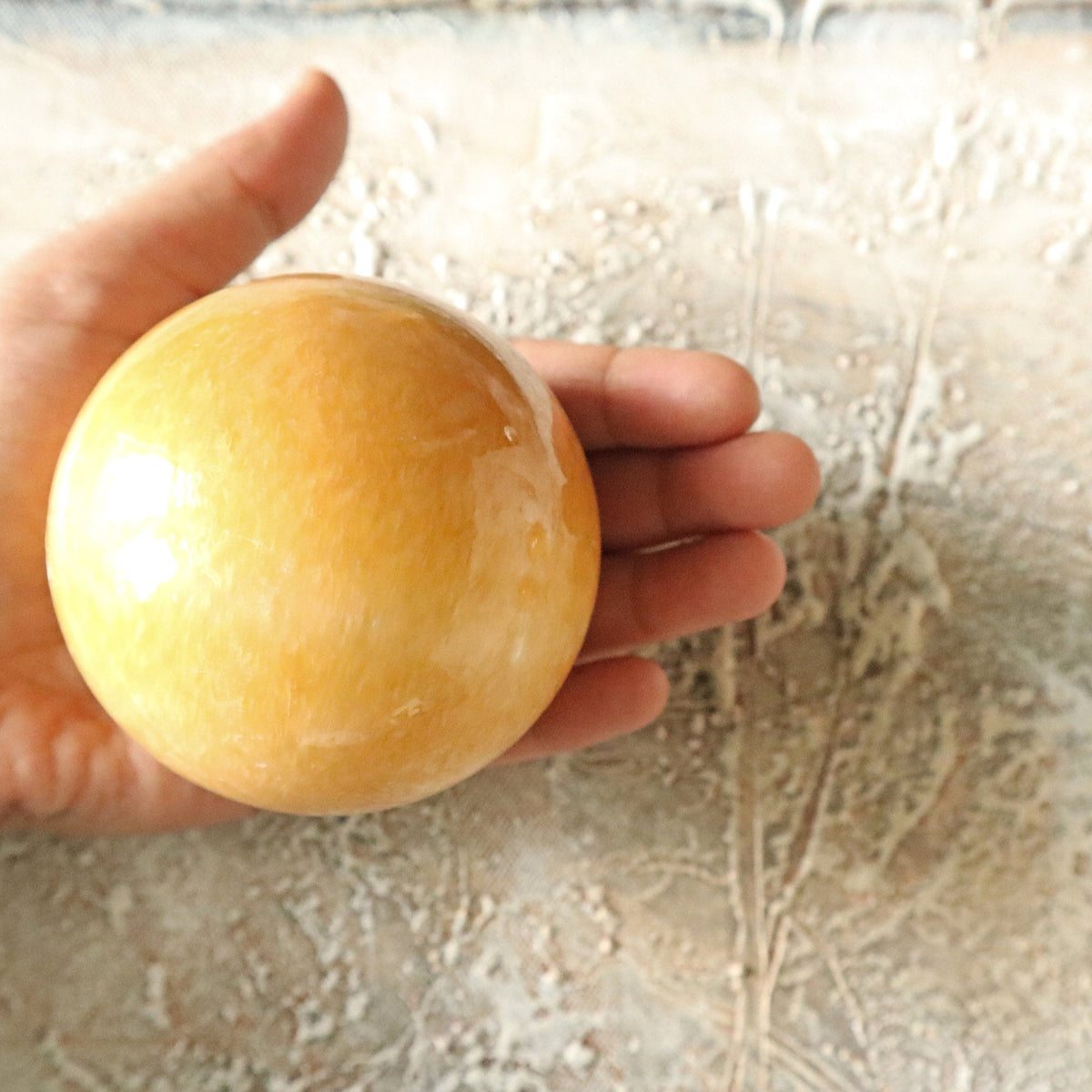 Orange Calcite Sphere 2.75 inch 489 grams 70mm 17.25 oz