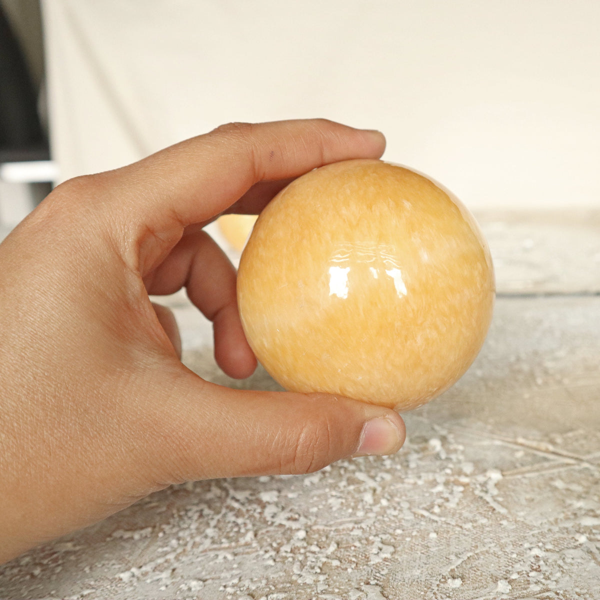 Orange Calcite Sphere 2.75 inch 489 grams 70mm 17.25 oz